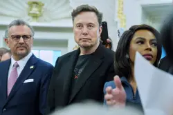 Musk leaving the Trump White House after bill criticism